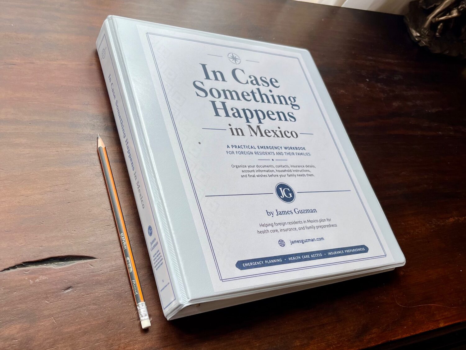 Angled view showing the workbook cover and binder spine